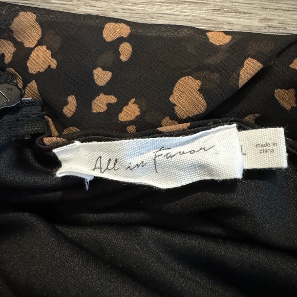 Open back mid length dress, brand All In Favor from Francesca’s Boutique. - Picture 3 of 3